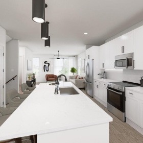 a kitchen with white cabinets
